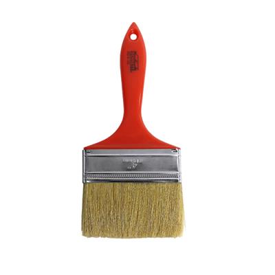 Brush with red plastic handle